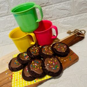 Cosmic Brownie cookie display with colourful cups