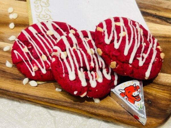 Red riding hood cookies stacked with cream cheese